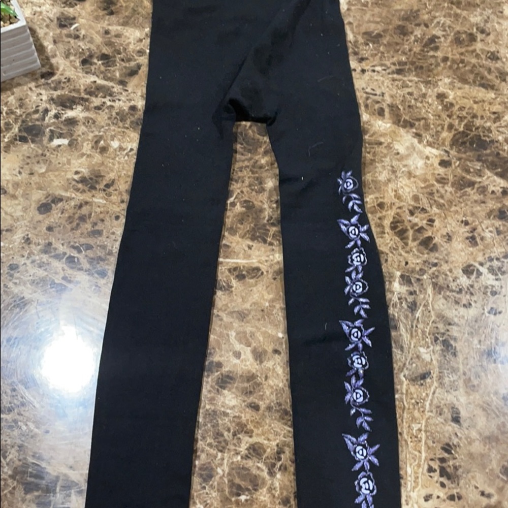 Black leggings with floral pattern